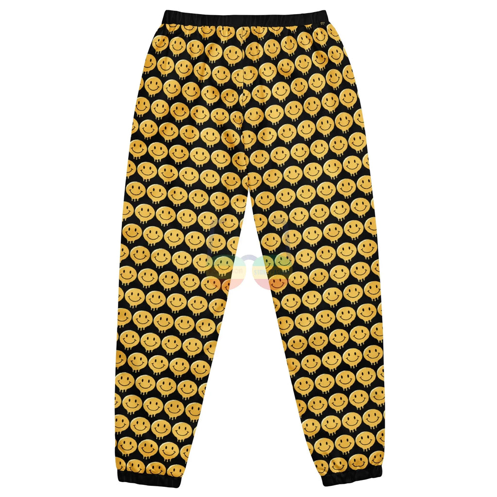 Smile For Us Unisex Track Pants – Zwart Waterafstotend Streetwear met zwart-geel smiley patroon.