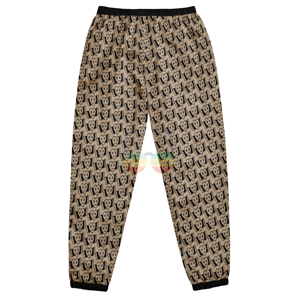 High Heart X Unisex Track Pants – Wit Waterafstotend Streetwear met uniek printpatroon in zwart en bruin.